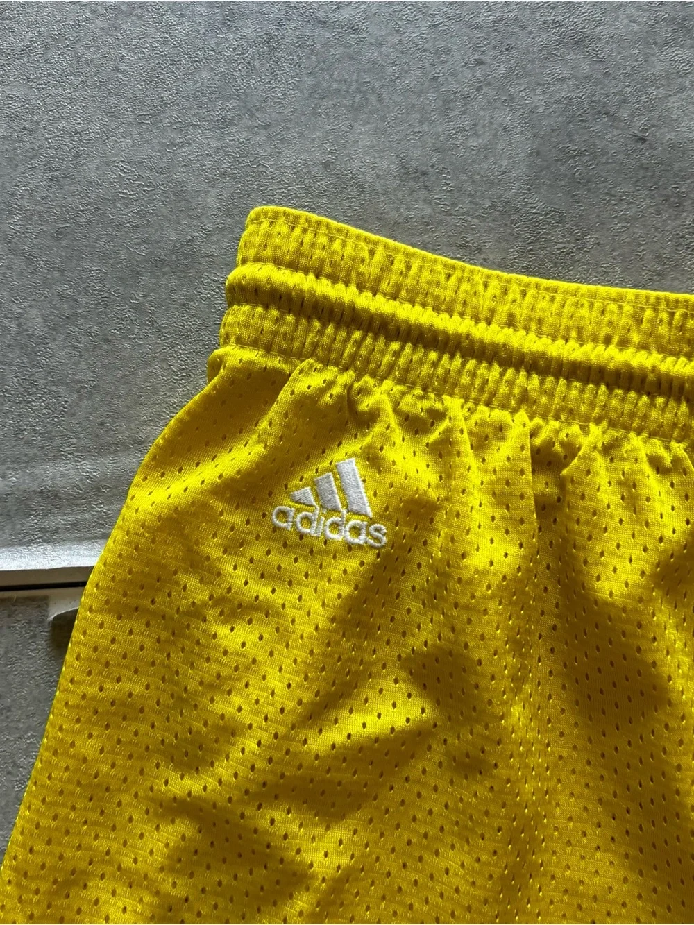 Y2k adidas yellow u of m athletic shorts